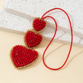 Beaded Red Heart Trio Pendant with Gold-Tone Trim and Red Cord view 4