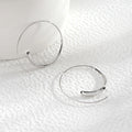 Slim Open Elongated Oval Wire Gold and Silver Hoop Earrings view 3