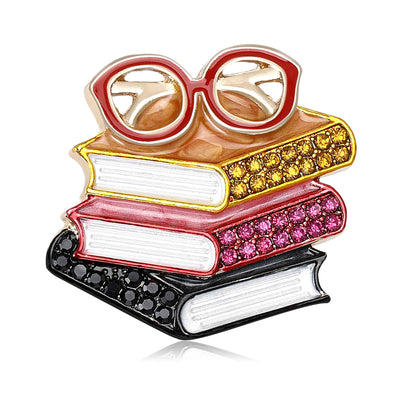 Books And Glasses Brooch shown alone on a light background