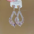 Pink Crystal Bow Teardrop Earrings with Reflective Details view 6