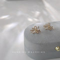 Gold Pavé Clear Cubic Zirconia Mini Bow Ribbon Stud Earrings view 3