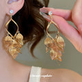 Gold Tone Open Filigree Leaf Cluster Statement Drop Earrings view 3