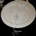 Pearl and Crystal Cross Layered Statement Necklace view 4