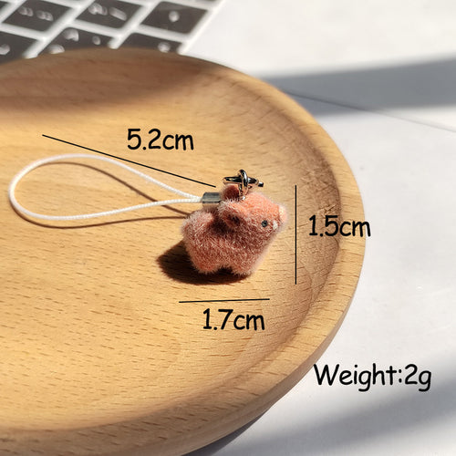 Brown flocked pig phone charm with size and weight measurements