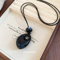Translucent Teardrop Pendant Cord Necklaces in Three Colors view 3