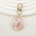 Gold Tone Round Pressed Daisy Resin Clip Keychains view 9