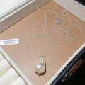 Silver Tone Necklace With Large Teardrop Pearl Like Pendant view 6