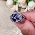 Blue Geometric Crystal Band Ring in Polished Metal view 3