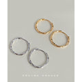 Hammered Round Huggie Hoop Earrings In Silver And Gold Tone view 1