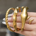 Sculpted Hinged Bangle Collection in Three Gold Tone Designs view 3