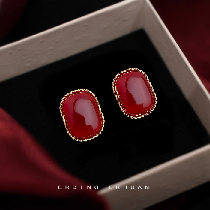 Gold Twisted Frame Wine Red Cushion Cabochon Stud Pair