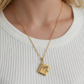 Engraved Openable Book Pendant Necklace in Three Metal Finishes view 2