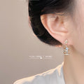 Snowflake Light Blue Spiral Ribbon Drop Earrings CZ view 2