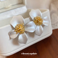 White Flower Stud Earrings with Gold Tone Centers with Decorative Details view 2