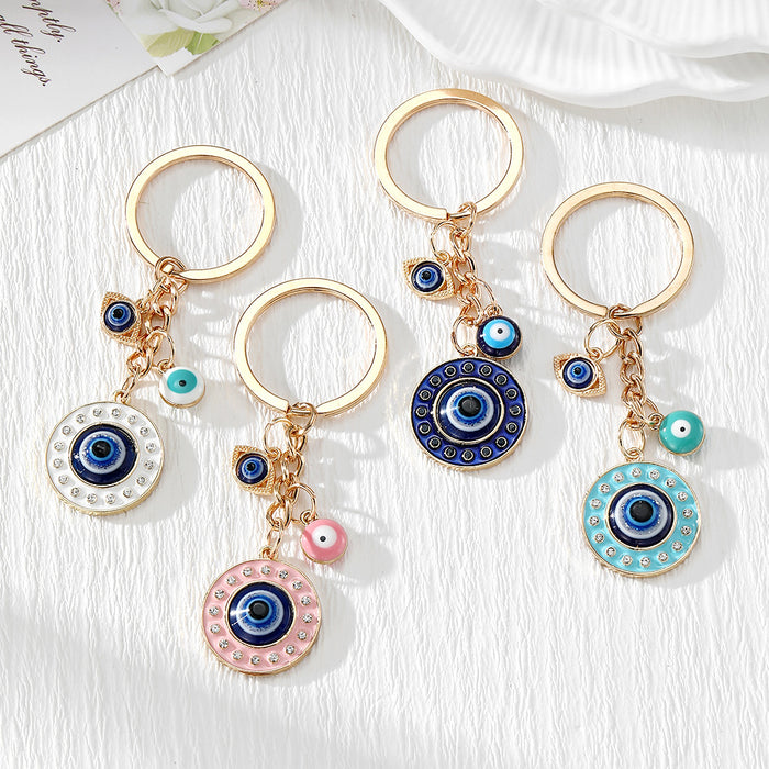 Gold Tone Round Rhinestone Evil Eye Keychains in Four Colors