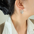 Twisted U-Shape Hoop Earrings Gold Steel Color Options view 6