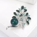 Branch With Pearl Brooch In Metal With Faceted Crystal Leaves And A Large Colored Round view 2