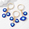 Gold Tone Triple Blue Evil Eye Split Ring Keychains view 1