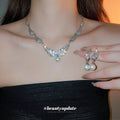 Silver Tone Crystal Wing Earrings And Necklace With Pearl Drops view 2