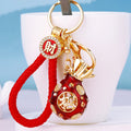 Round Fortune Pouch Keychains with Braided and Bare Wrist Loop Options view 1