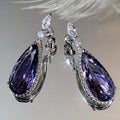 Purple Pear-Shaped Halo Long Drop Earrings In Silver Tone view 1
