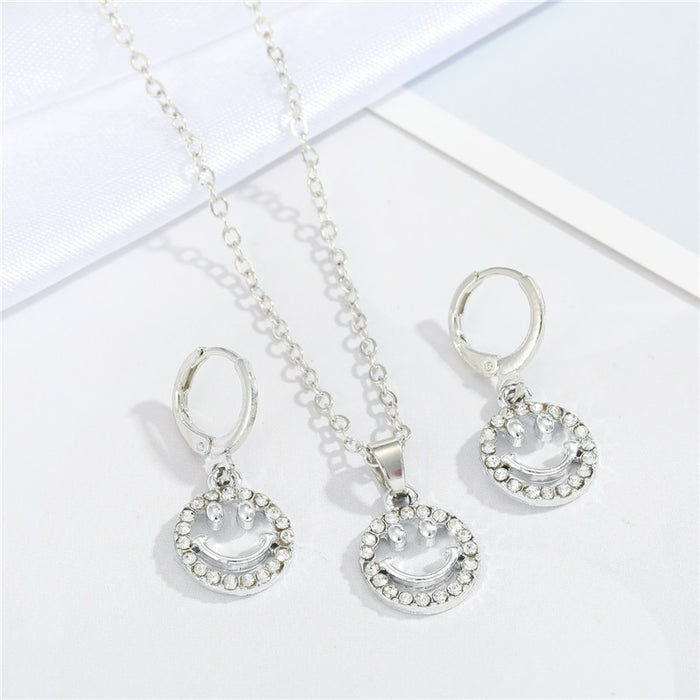 Silver Tone Crystal Smiley Necklace and Matching Earring Options