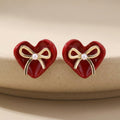 Red Heart Bow Pearl Look Delicate Small Stud Earrings view 1