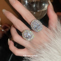 Oversized Clear Oval Solitaire Halo Ring In Silver Or Gold Tone view 3