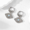 Gold and Silver Tone Multi Ring Crystal Evil Eye Huggie Earrings view 7
