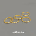 Gold Tone Slim Textured Band And Clear Square Stone Ring view 1
