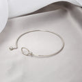 Silver Expandable Knot Wire Bangle Bracelet Ball End view 2