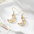 Gold Tone Crescent Moon Pressed Flower Drop Earrings in Eight Designs view 9