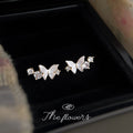 Gold Tone Pearlescent Wing Butterfly Clear Stone Stud Earrings view 4