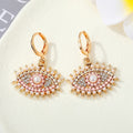 Gold Tone Ornate Crystal Evil Eye Huggie Drop Earrings in Seven Designs view 12