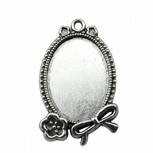 Oval Flower and Bow Cabochon Setting, 18x25 mm Inner, Two Finishes