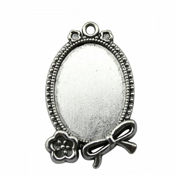 Oval Rose and Bow Cabochon Settings in Two Finishes