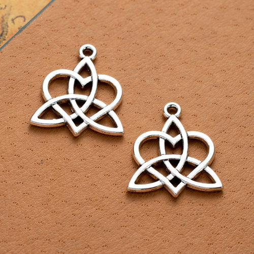 Second product image of the celtic heart knot pendant showing three interlaced heart forms creating a symmetrical open k