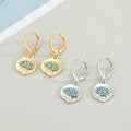 Gold and Silver Tone Textured Eye Medallion Huggie Earrings view 1