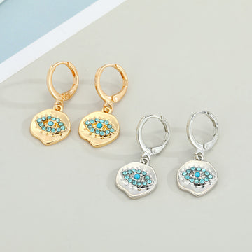 Gold and Silver Tone Textured Eye Medallion Huggie Earrings
