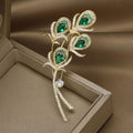 Green Crystal Peacock Feather Brooch With Gold Tone Stem view 2