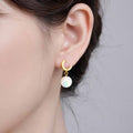 Gold Huggie and Iridescent Pearl Look Drop Earrings view 2