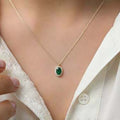 Gold Tone Green Oval Halo Pendant Necklace on Fine Chain view 3