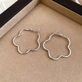 Flower Outline Hoop Earrings in Gold Red and Silver view 8
