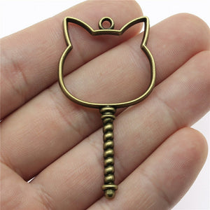 Cat Head Open Frame Charm In Antique Bronze For Jewelry Making
