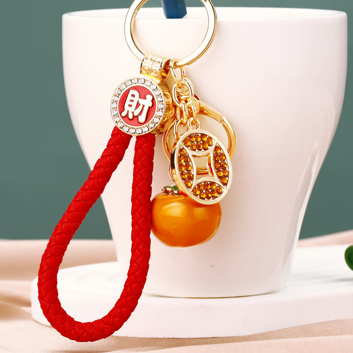 Coin and Persimmon Charm Keychains with Braided Wrist Loops