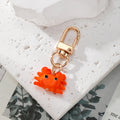 Gold Tone Glass Crab Clip Keychains in Six Bright Colors view 6