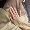 Silver Textured Five-Petal Flower Open Ring Gold Center view 4