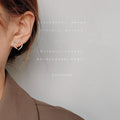 Gold Tone Asymmetric Hollow Bow And Pave Heart Stud Earrings view 3