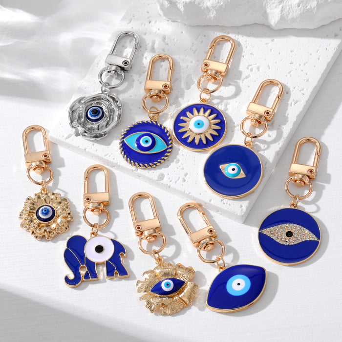 Gold and Silver Tone Deep Blue Evil Eye Clip Keychains
