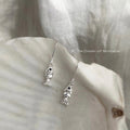 Silver Fish Charm Hook Earrings Black Eye Detail Pair view 3